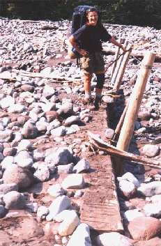 washed out footbridge on Mowich River on the Wonderland Trail