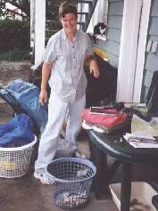 Rachel sorts our stinky Wonderland Trail laundry, back in Vancouver, British Columbia